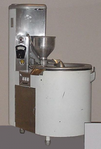 Photograph of the doughnut machine used to extrude Krispy Kreme doughnuts until the 1960s.