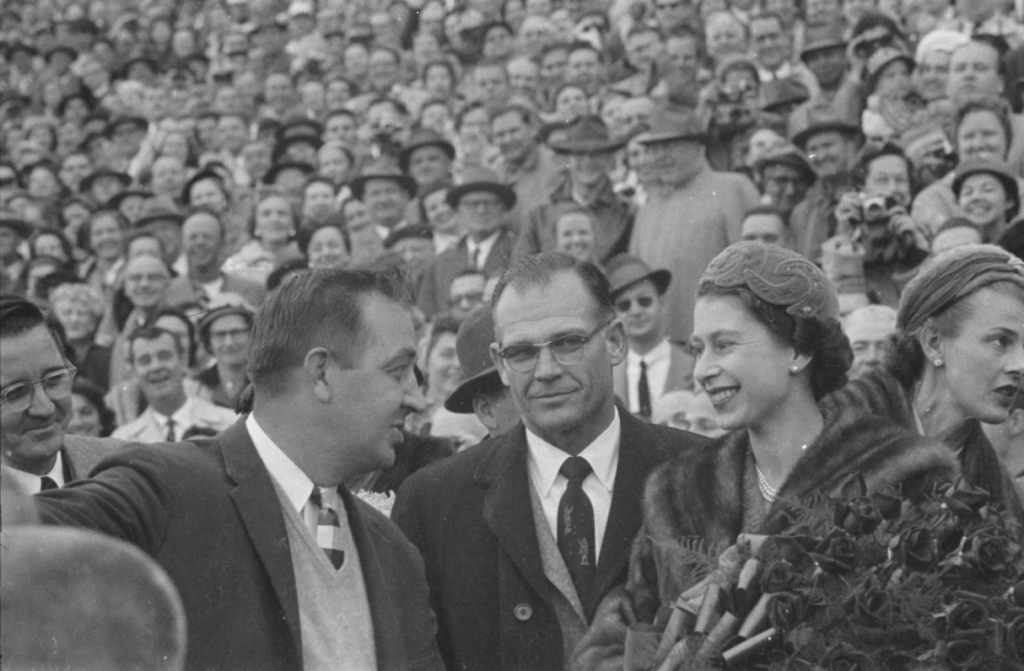 Queen Elizabeth II attends a UNC vs Maryland football game.